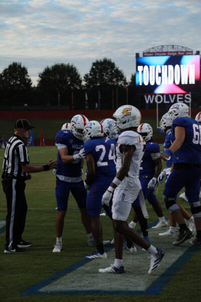 University of West Georgia running back Christian Monfort celebrates with other Wolves players after scoring a touchdown against the UT Chattanooga Mocs on August 27, 2026
