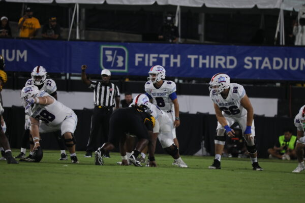 University of West Georgia quarterback Collin Hurst and the offensive line make pre snap adjustments during their game against the Kennesaw State Owls on Sept. 3, 2026