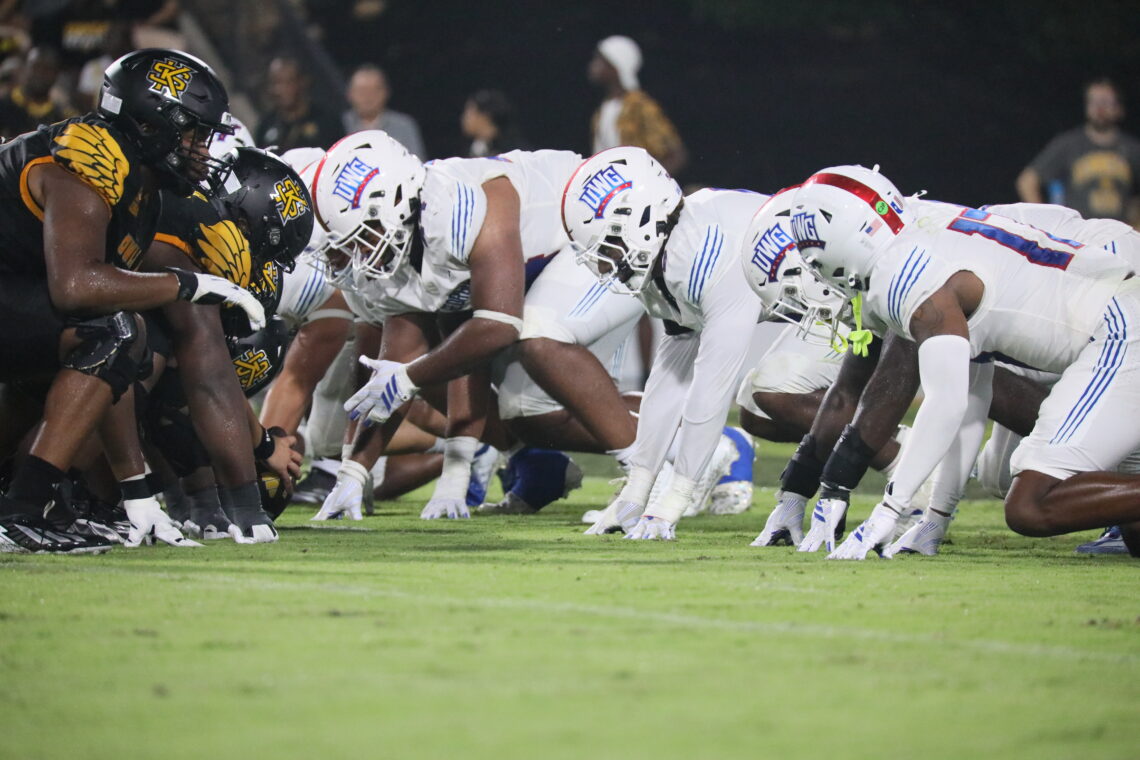 University of West Georgia offensive line gets in stances in anticipation of the ball being snapped in their game against the Kennesaw State Owls on Sept. 3, 2026